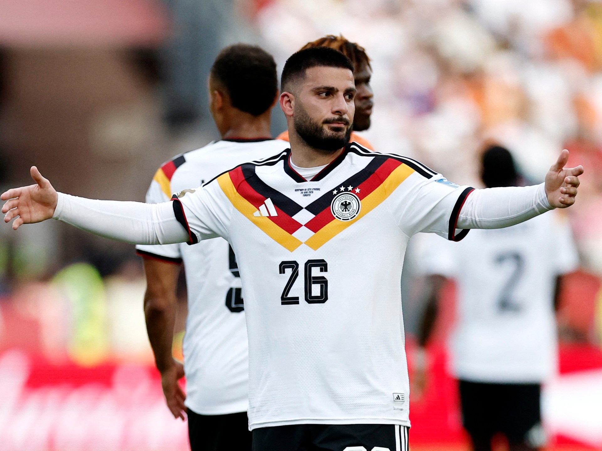 Germany secures first-place spot in World Cup group with late win