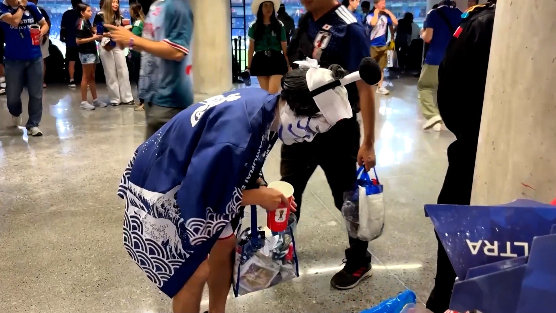 Japanese fans thoroughly clean stadium seats after World Cup victory celebration