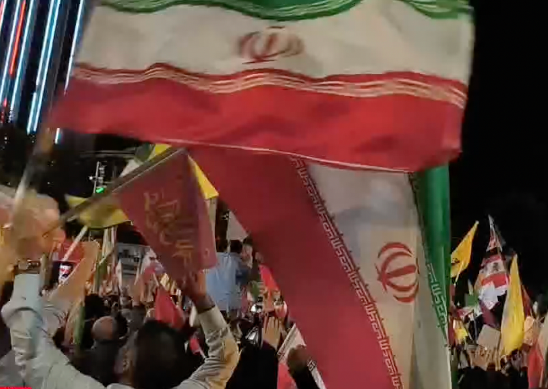 Missiles fired from Iran hit Israeli territory, prompting celebrations in Tehran