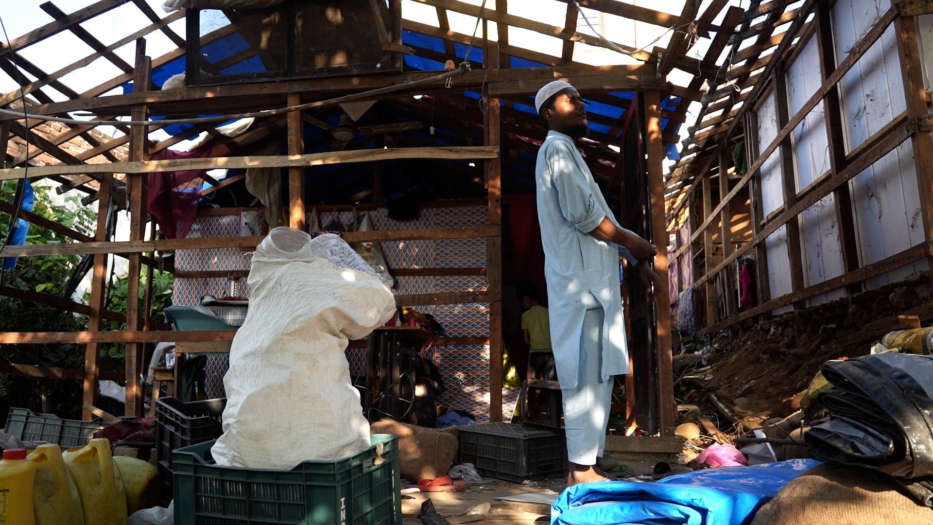 Rohingya people dismantle homes due to eviction threat in Kashmir region